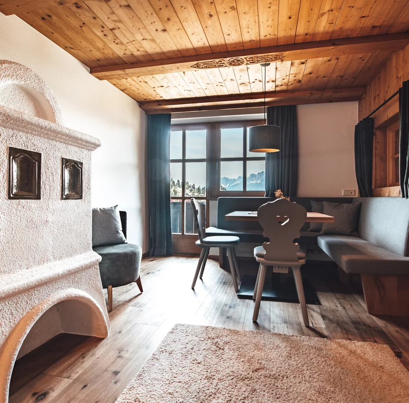 Hotel Chalets Grosslehen Appartement Grosslehen fireplace sitting area and fireplace Appartement Grosslehen