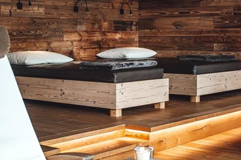 rest room with deck chairs and beds